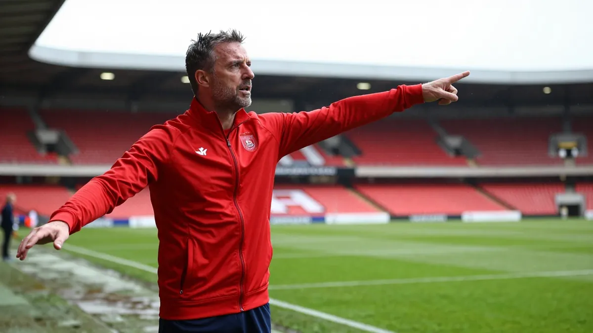 Ian Holloway has reaffirmed his belief in the Swindon Town squad and called for unity from fans after the team was booed...