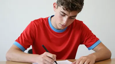 Swindon Town academy players Noah Chapman and Freddie Hoare sign early scholarships, accelerating their development and...