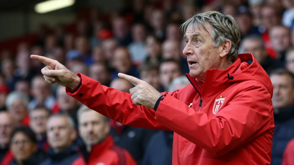 Ian Holloway says Swindon Town fans created a rocking atmosphere that helped the team secure a 3-1 comeback win, with...